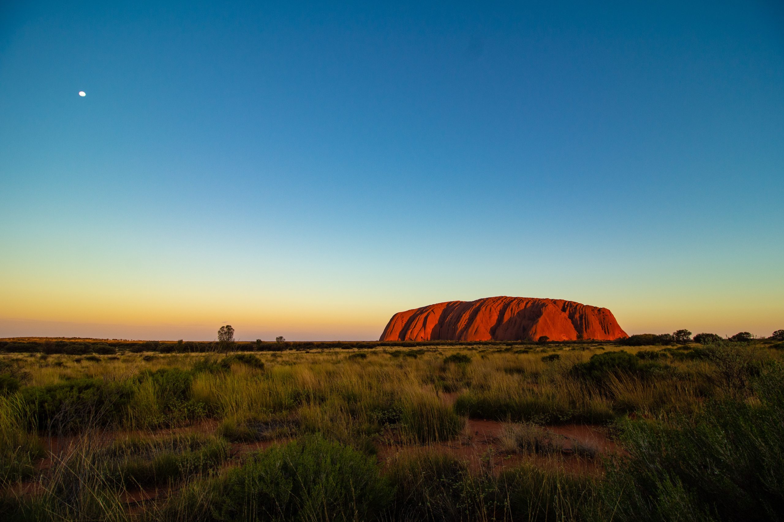 Photo of Uluru at sunrise by Ondrej Machart