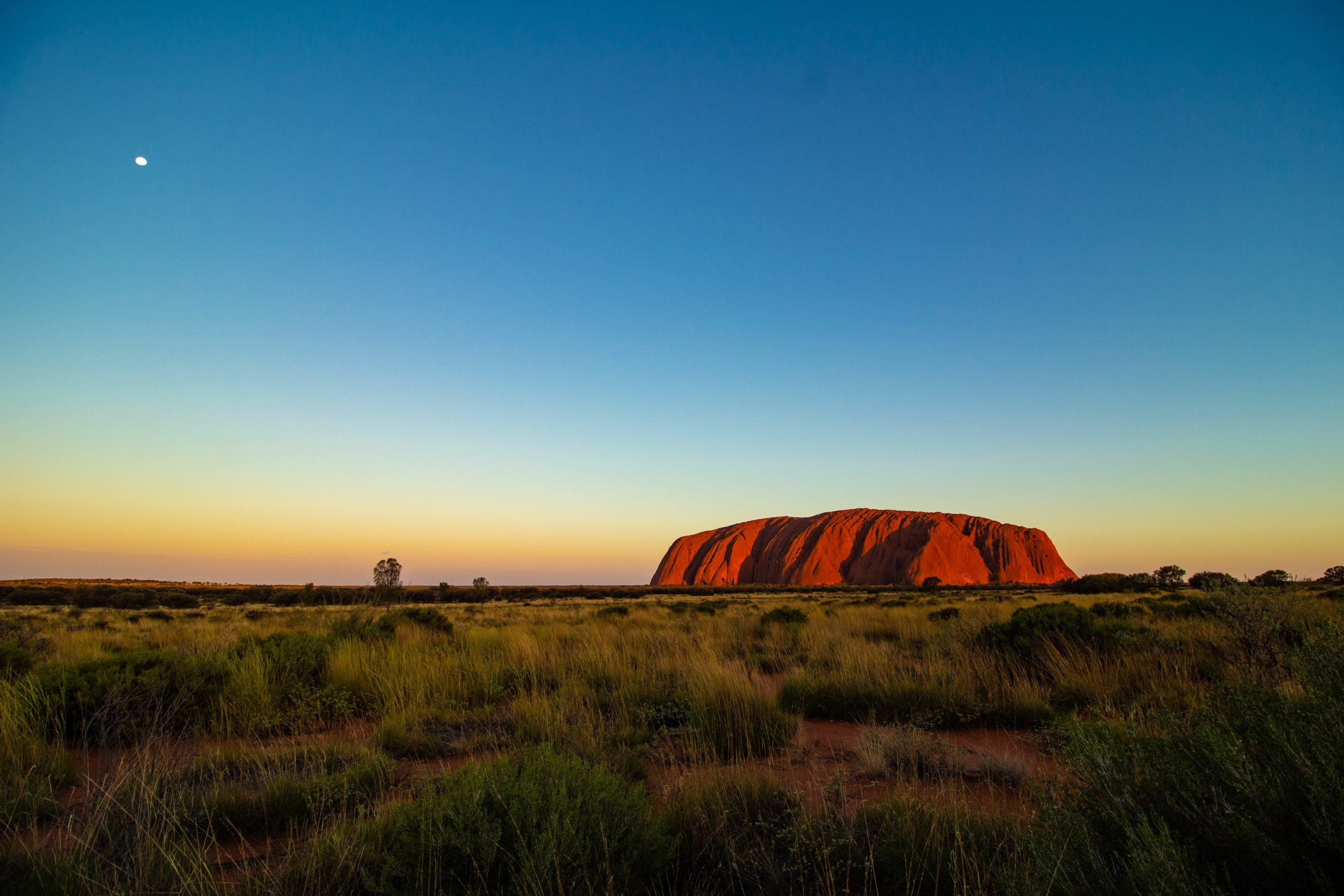 Photo of Uluru at sunrise by Ondrej Machart