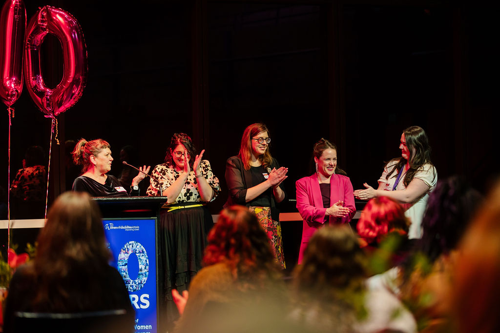 On stage at the Enabling Women 10 Year Celebration event: From left, LIz Wright, Brigitte Stone, Bridget Jolly and Sara Franzoni.